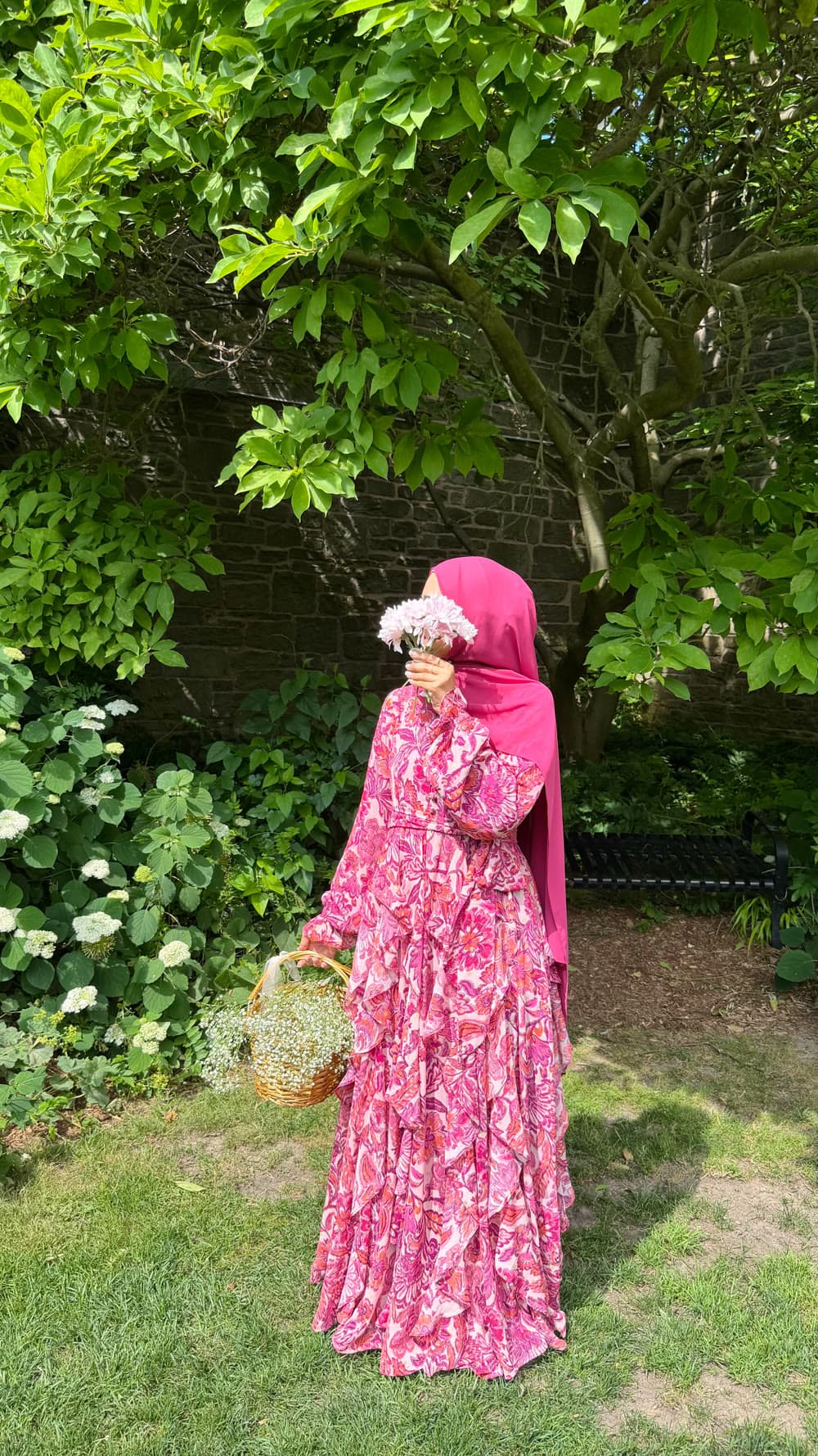 A pink floral dress, gathering flowers