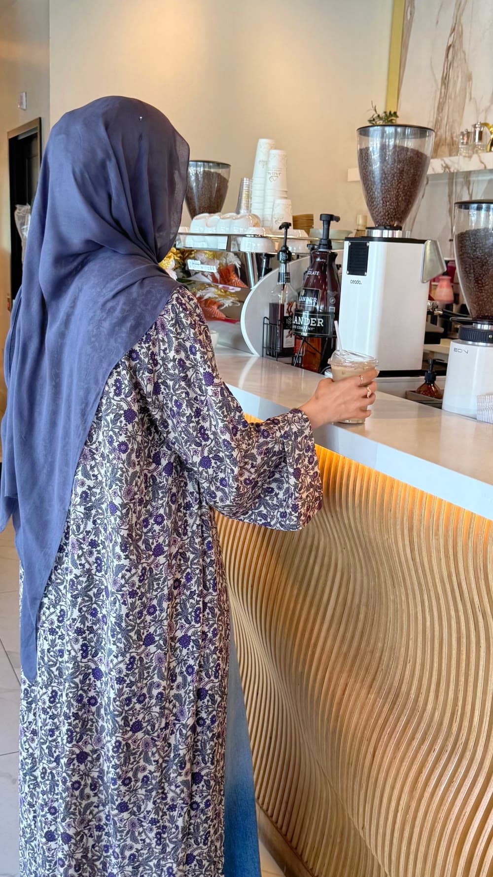 Ordering coffee at a modern counter
